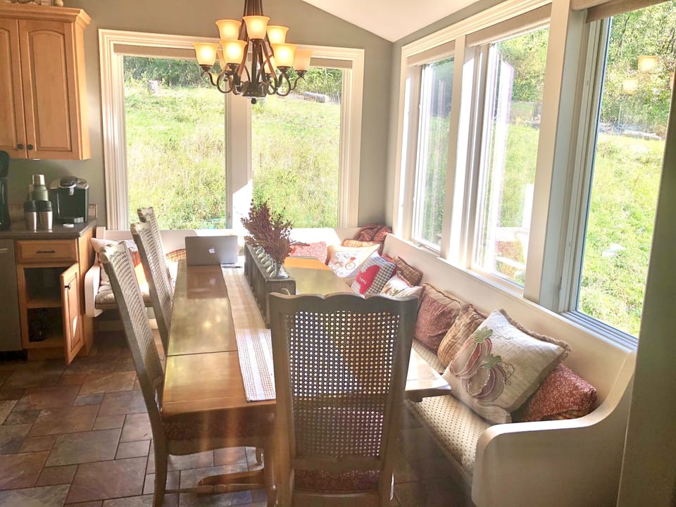 Kitchen table seating as seen from the dining/entry area
