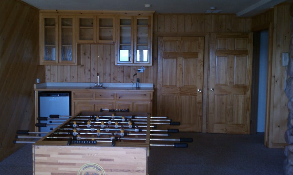 Other half of downstairs bedroom, with Murphy Wall bed (queen) on wall