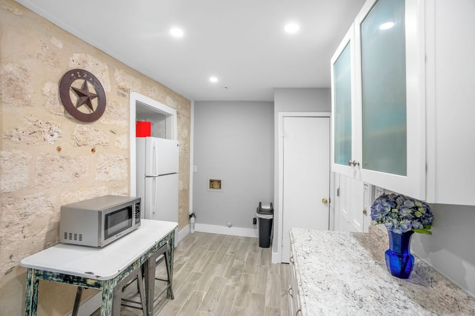 Newly renovated kitchen! Full size appliances, microwave, and new cabinets. 