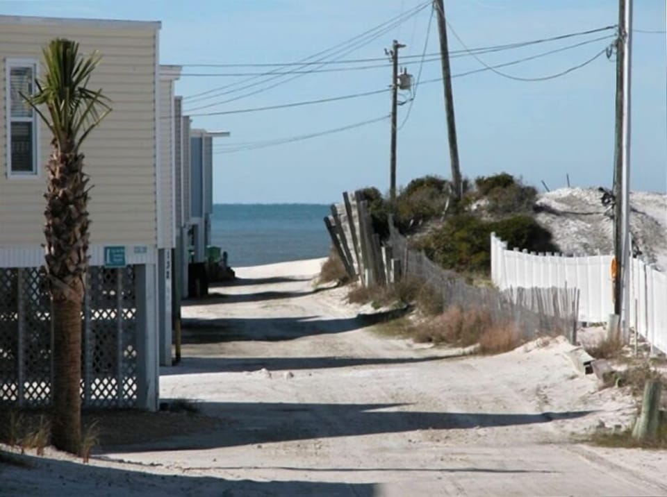 Sandy walkway to the beach.