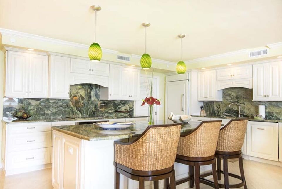 Newly remodeled kitchen featuring large island and high end appliances