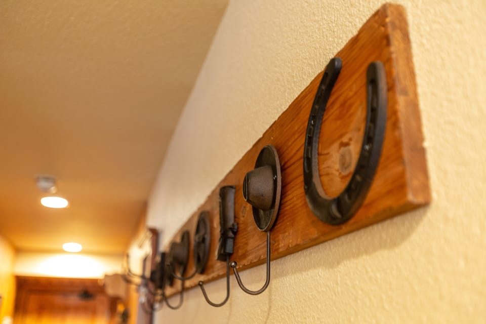 Plenty of hanging racks for clothes and ski wear.