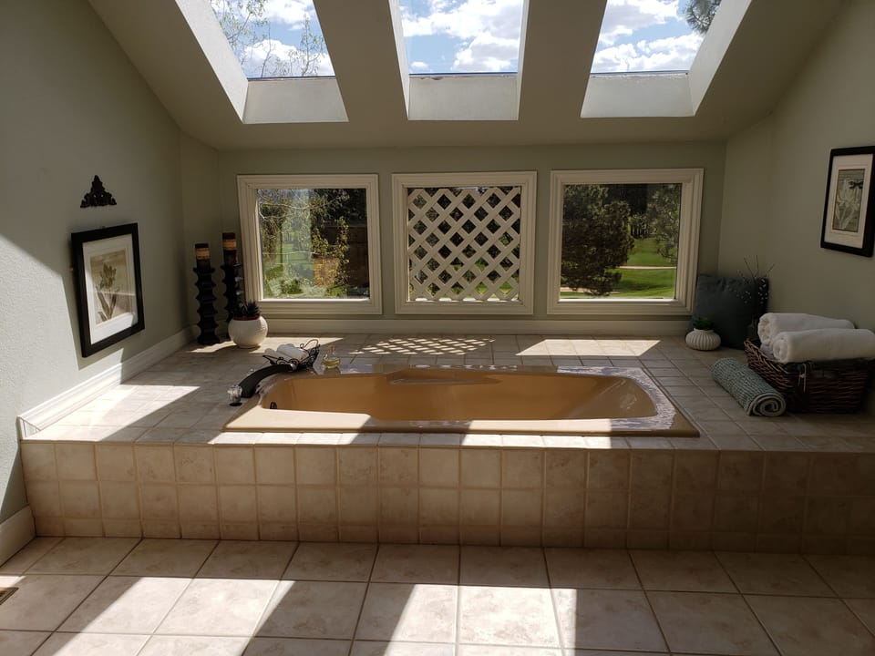 Upstairs master bathroom, bathtub