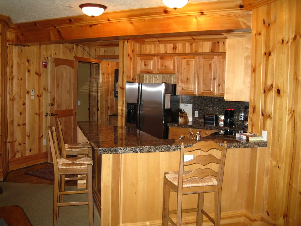 breakfast bar area, new stainless steel dishwasher installed for the season