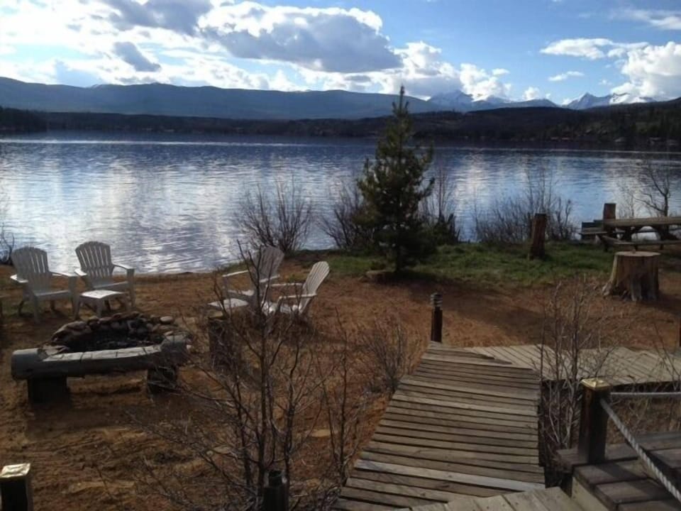 View of fire pit and beach from the patio.