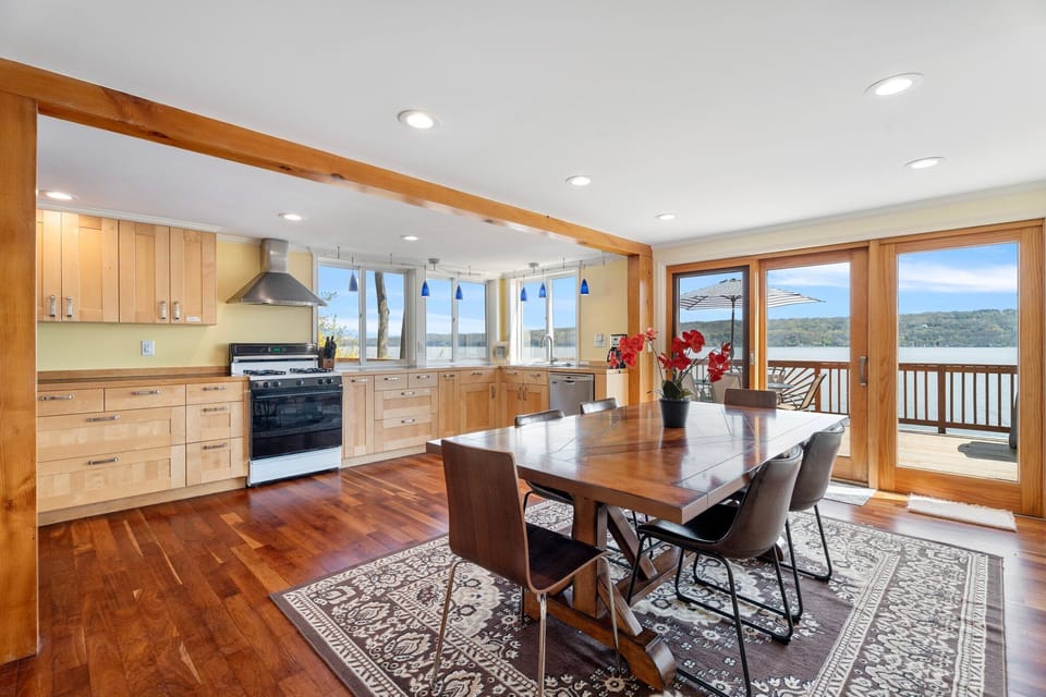 The eat-in kitchen has sliding glass doors to the deck for easy exterior dining.