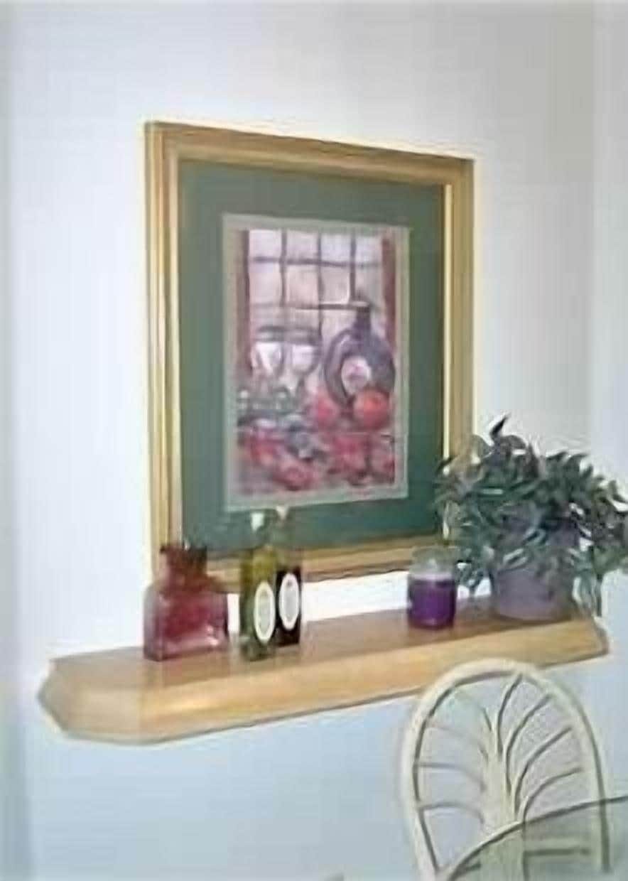 Kitchen nook w/ round glass table and 4 chairs