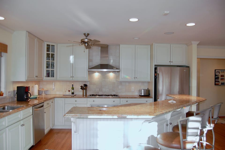 Open kitchen dining and living room invites opportunities for shared meal time.