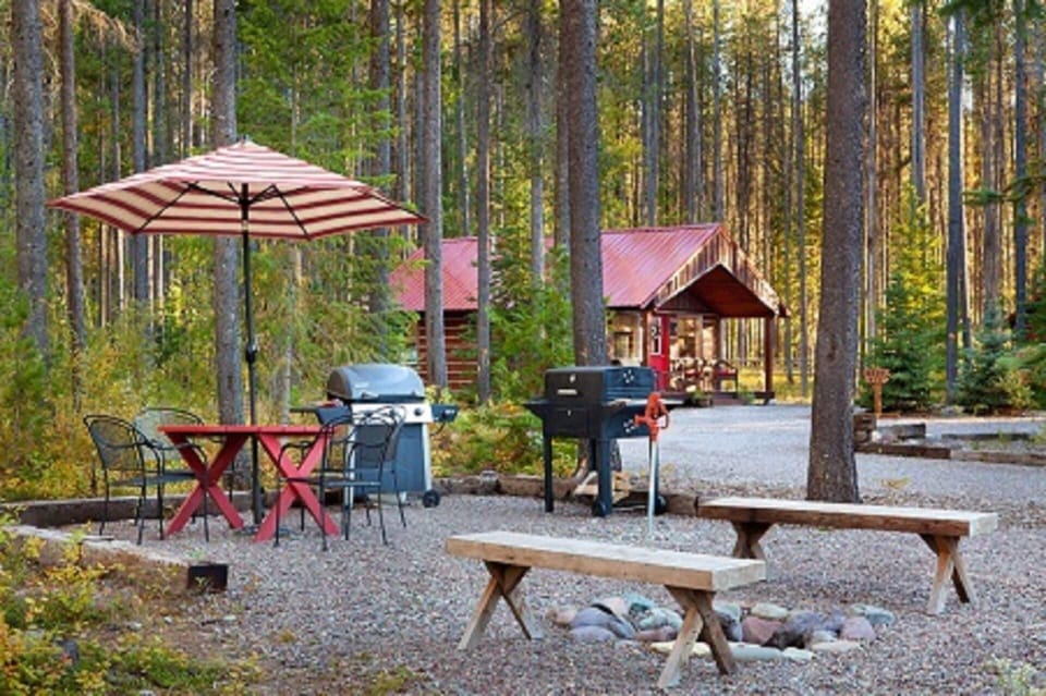 Community BBQ area with fire pit, gas grill & charcoal grill.