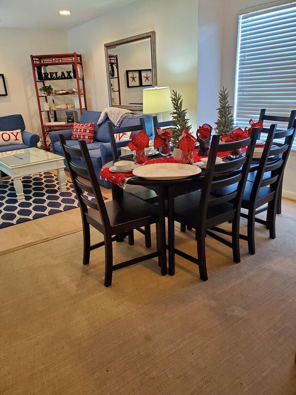 Large dining table with six chairs and expandable leaves.  Holiday Stay!