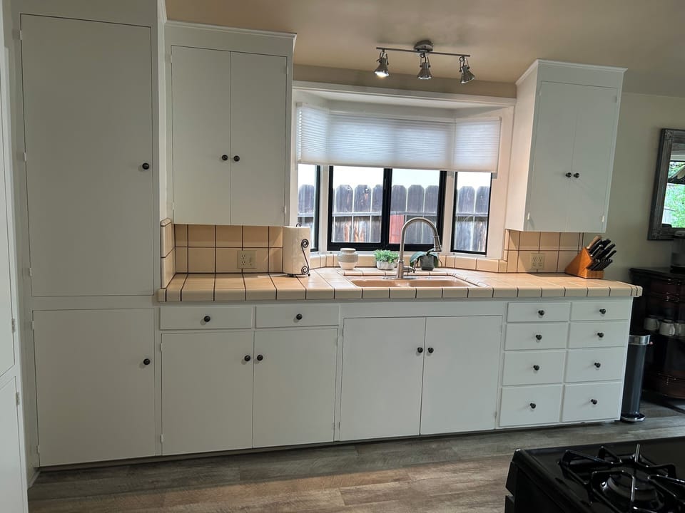 Kitchen -well stocked cabinets for all needs