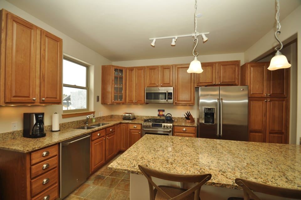 Upgraded GE Cafe kitchen appliances with gas stove
