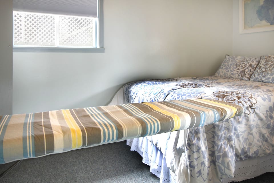 Fold out ironing board in second bedroom