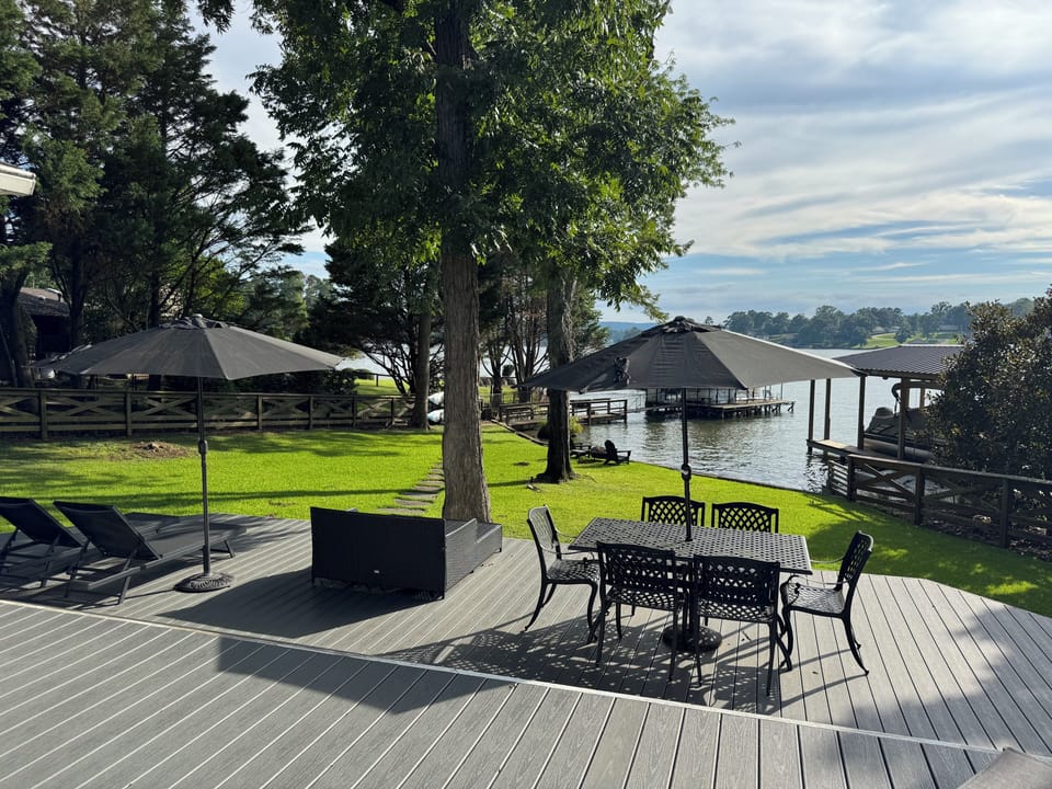 Umbrella-shaded outdoor dining. Grill available for guests.