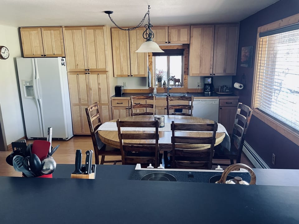 Kitchen -  adding 2 table leaves seats up to 8-10, with seating for 3 at counter