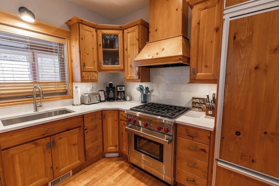 Wolf stove and many kitchen amenities for sharing meal prep! 