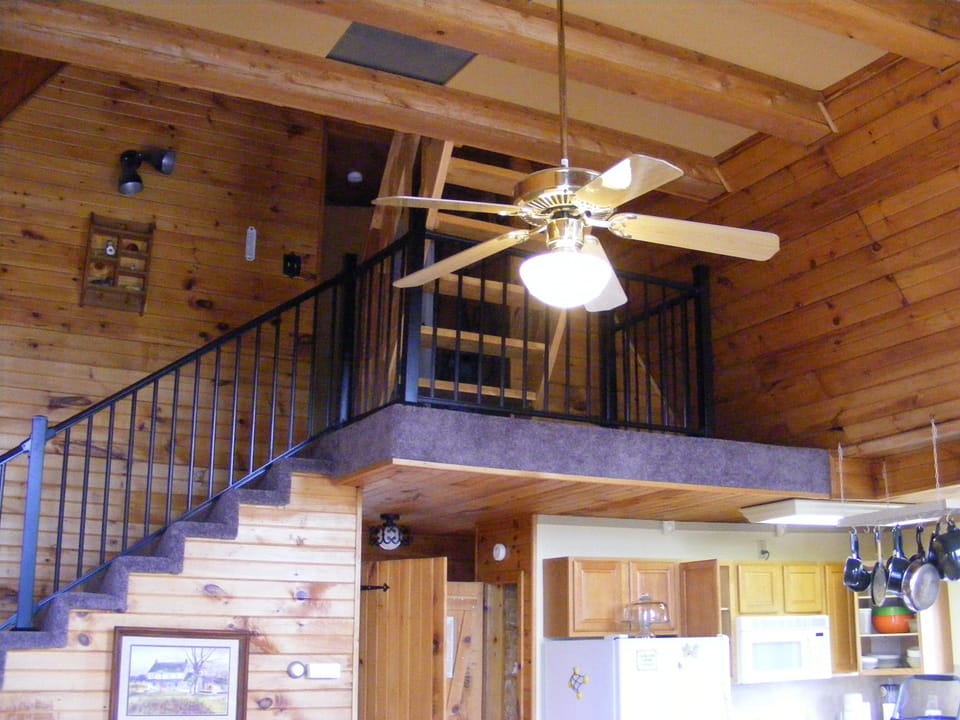 KITCHEN AND MAIN LIVING ROOM AND STAIRCASE