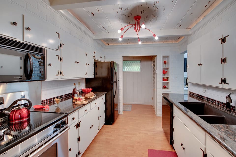 Microwave, dishwasher and granite counter tops