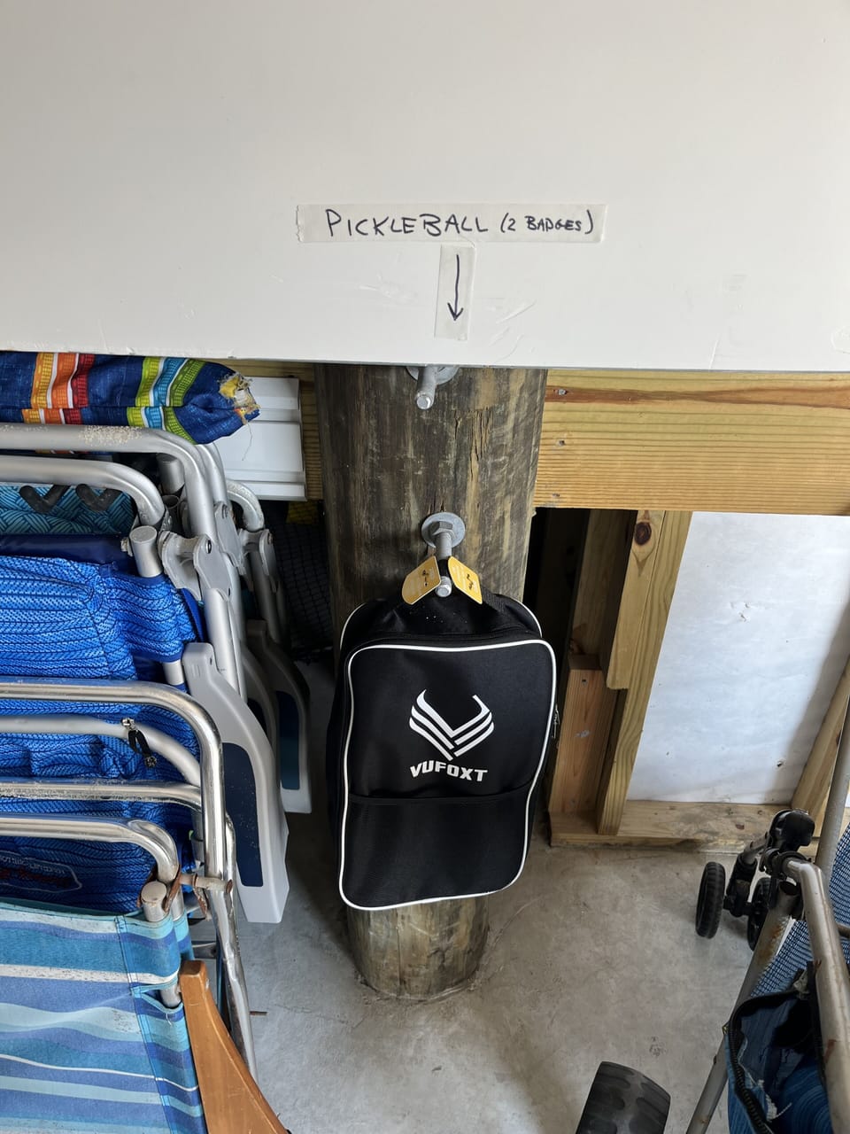 Pickleball paddles and badges.