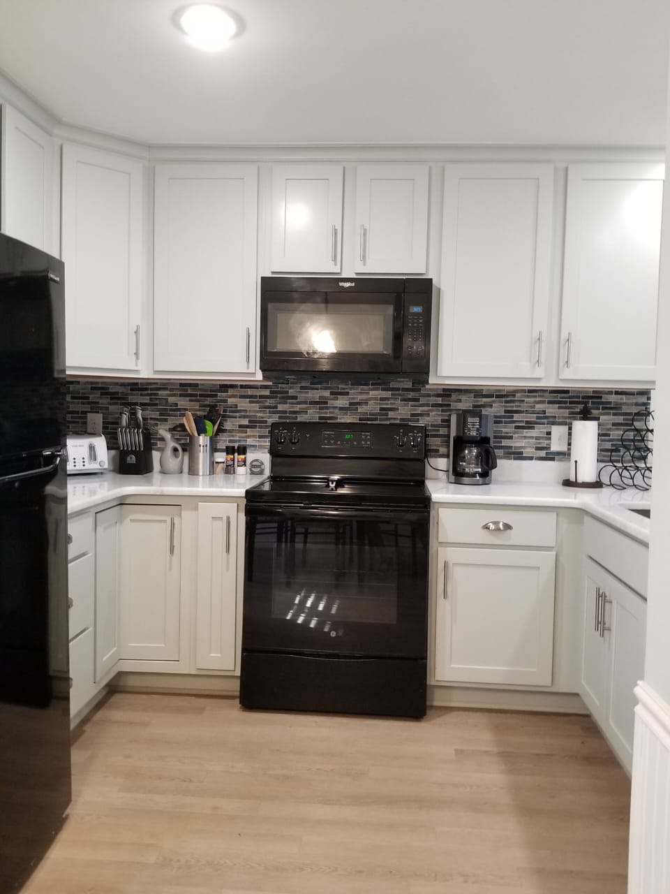 Granite Countertops/Cabinets to the Ceiling 