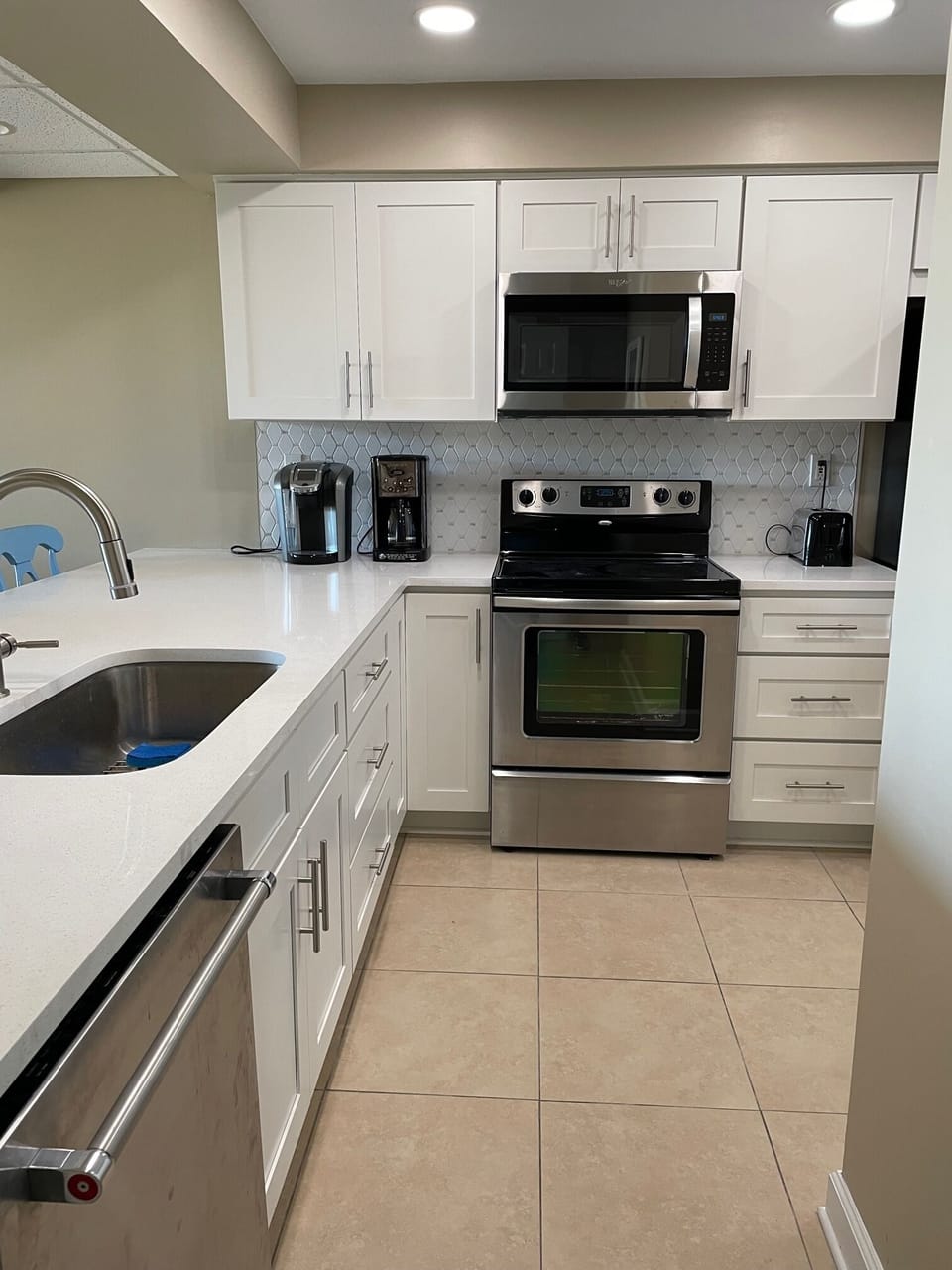 Kitchen with new countertops/sink/cabinets