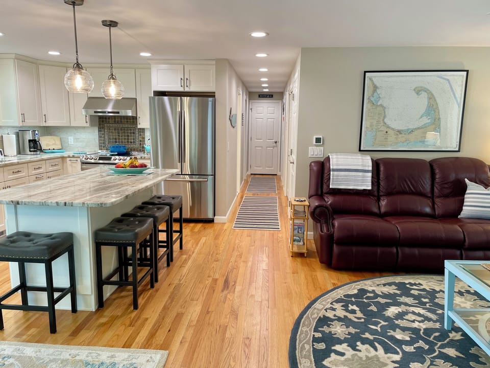 Hallway leads to 3 bedrooms and 2 full baths.