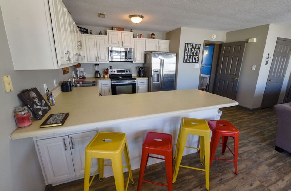 Sit and chat with the cook on the barstools!