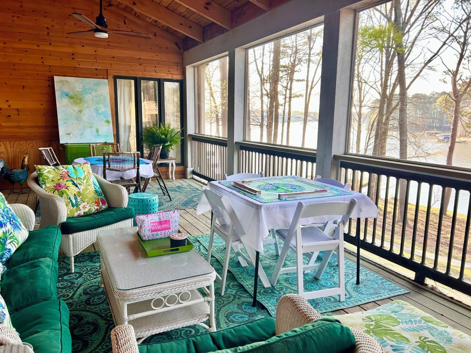 Bring your Mahjong set & play on the screened in porch with gorgeous lake views