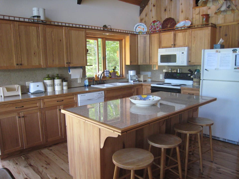 Have a seat at the bar and cheer on your chef