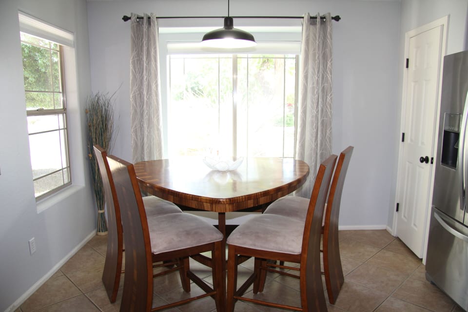 Kitchen table in front of window looking to street