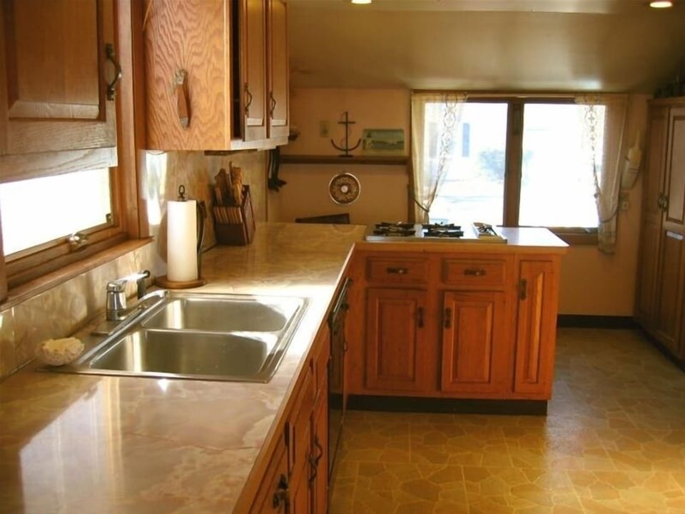 Plenty of counter space in this well equipped kitchen.