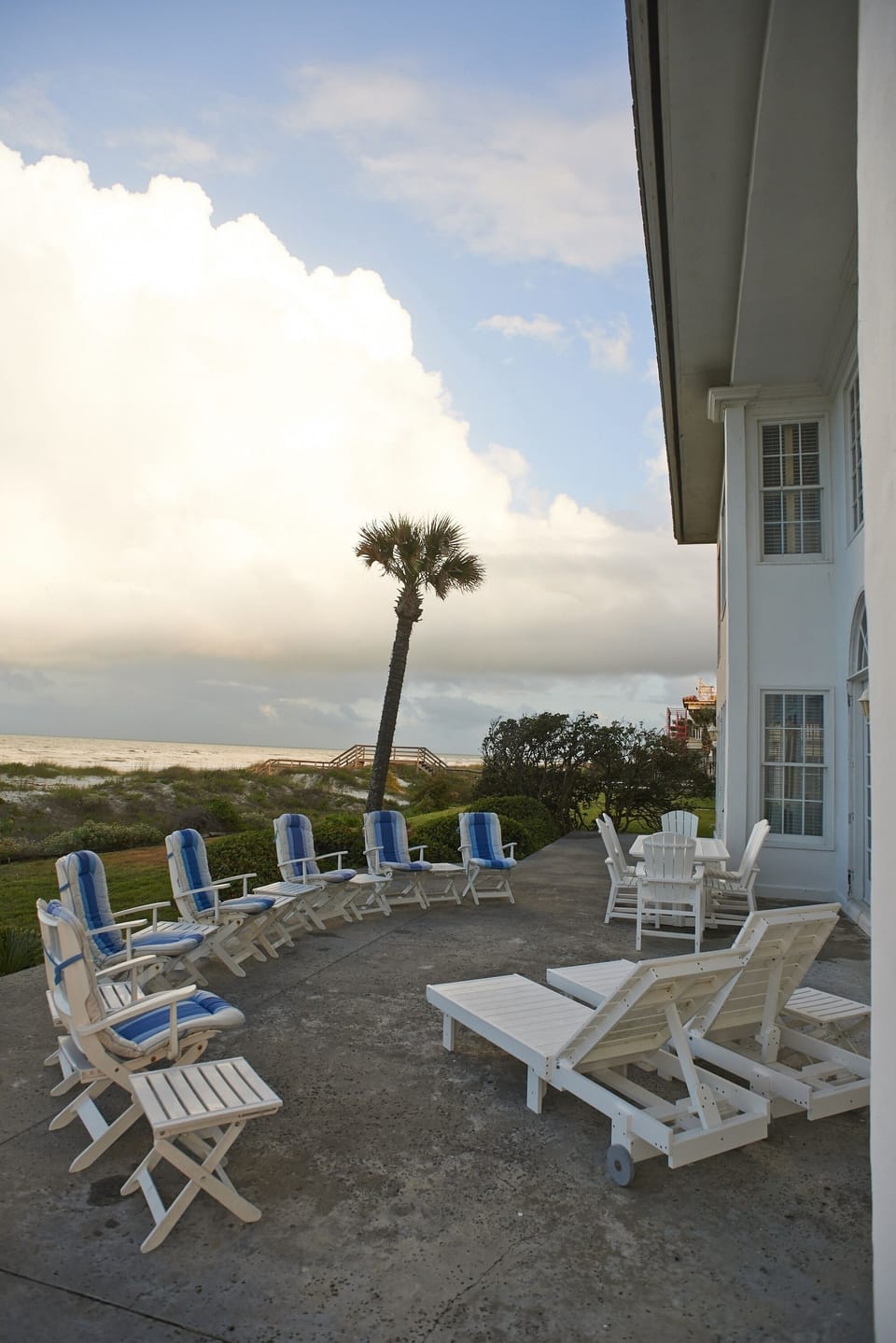 Back porch with comfortable, outdoor dining lighted for dinner under the stars!