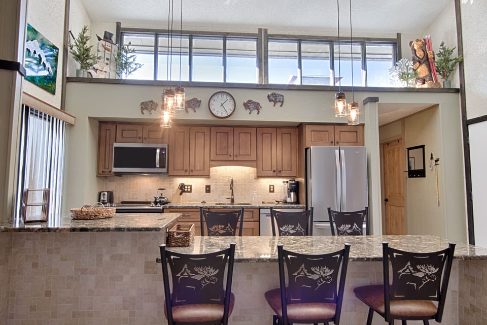 Udated & stocked kitchen. Sky lights provide a lot of natural light.