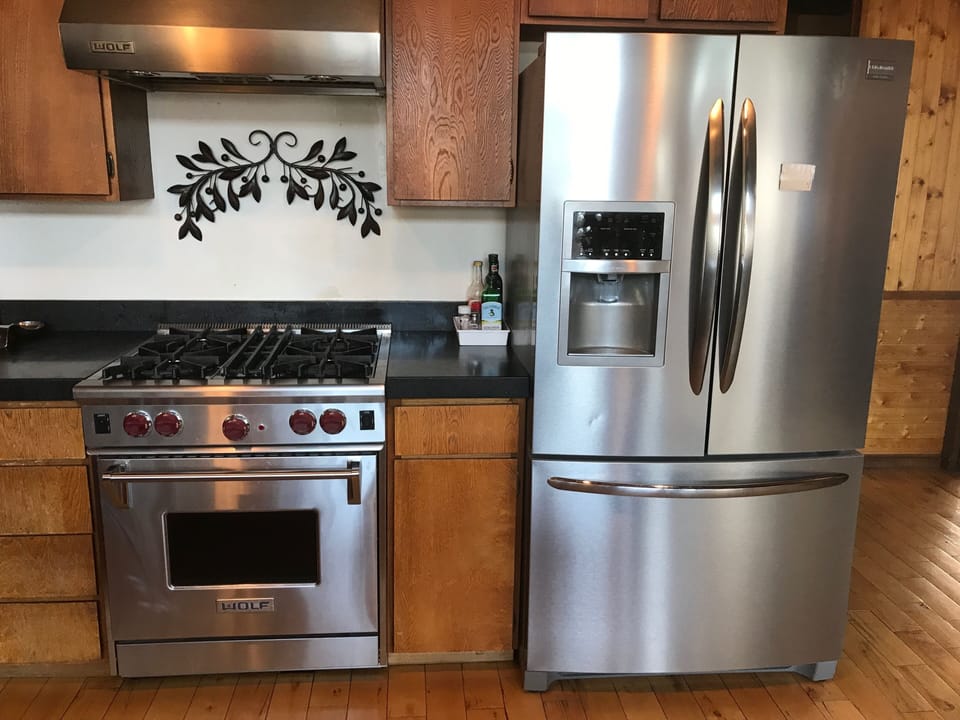 Wolf Stove and French doors fridge