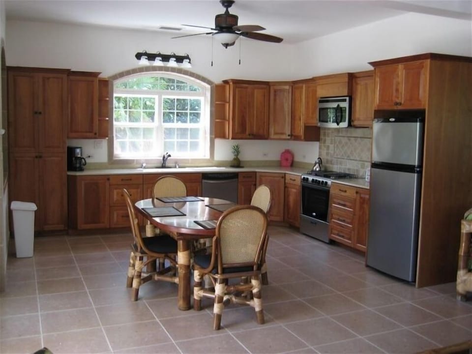 Large kitchen with all amenities, cooking ware, teflon coated pans, etc.