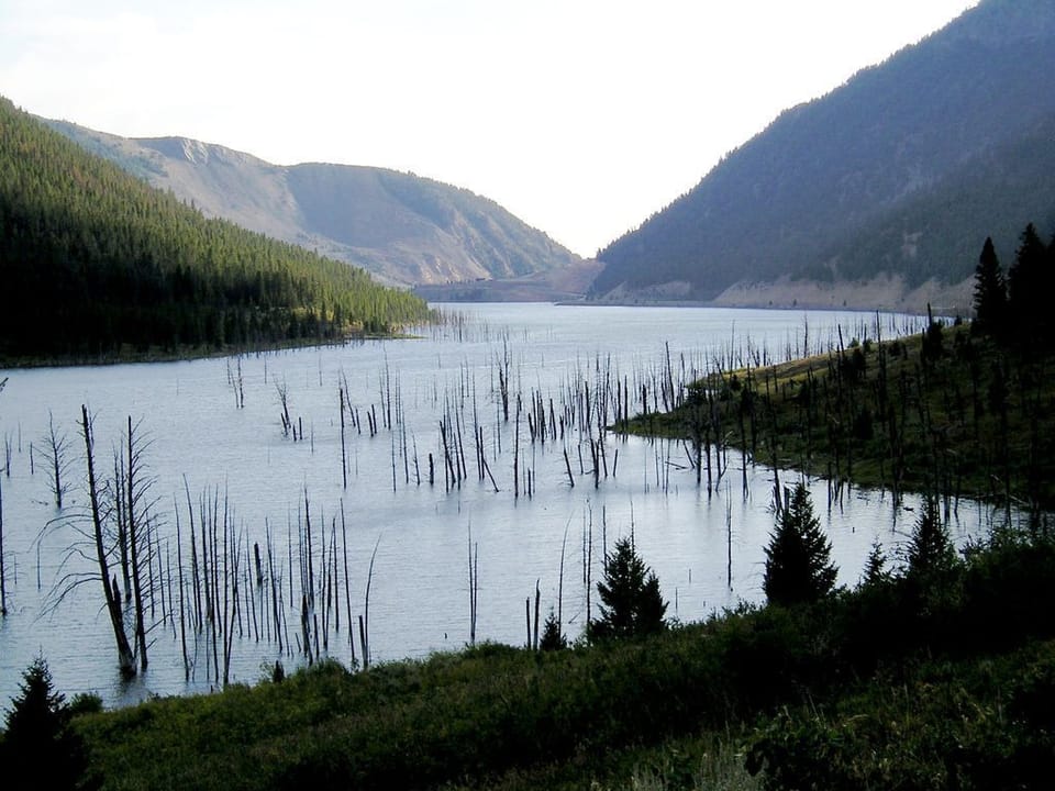 North of town on Hwy 287, Quake Lake was created in '59 by a 7.5 magnitude quake