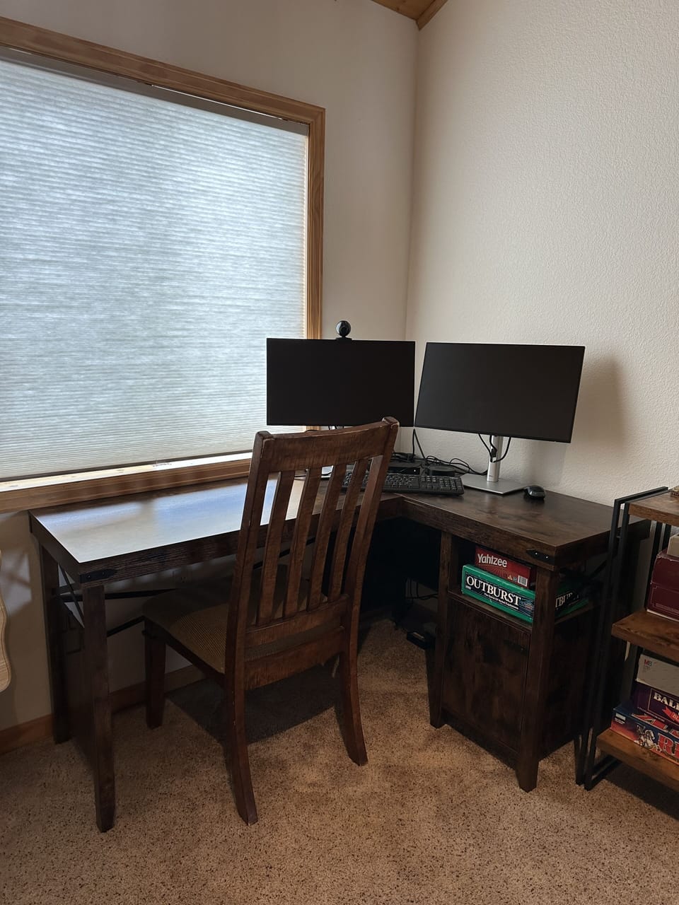Private workspace in the loft with docking station, monitors, etc