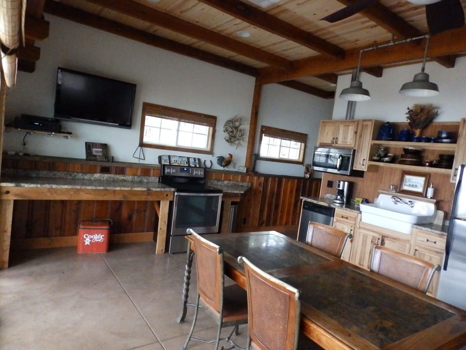 Kitchen Range and counter space with room for coolers under the counter.