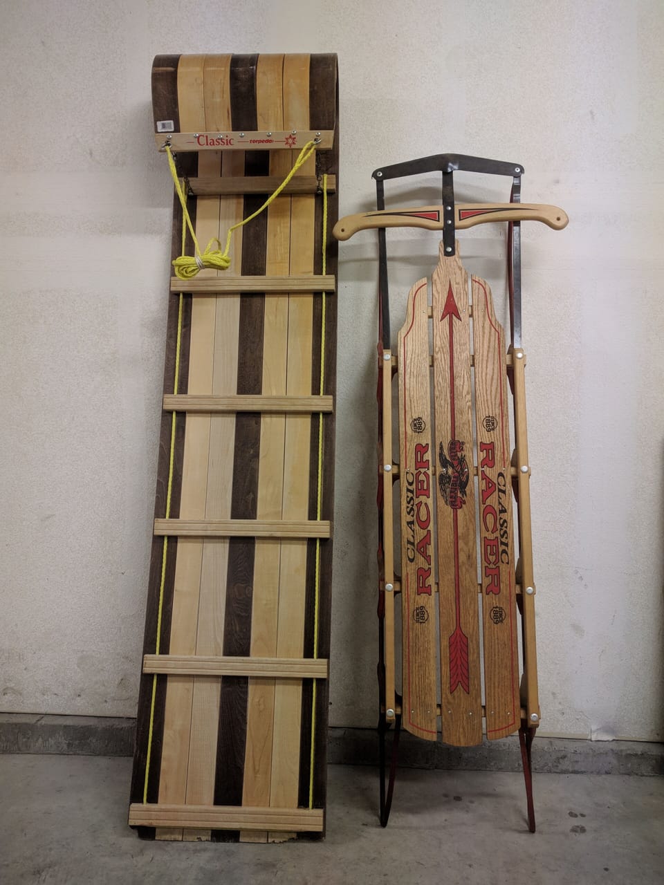 Two toboggans, big enough for teenagers and adults: 6' sled, racer on metal skis