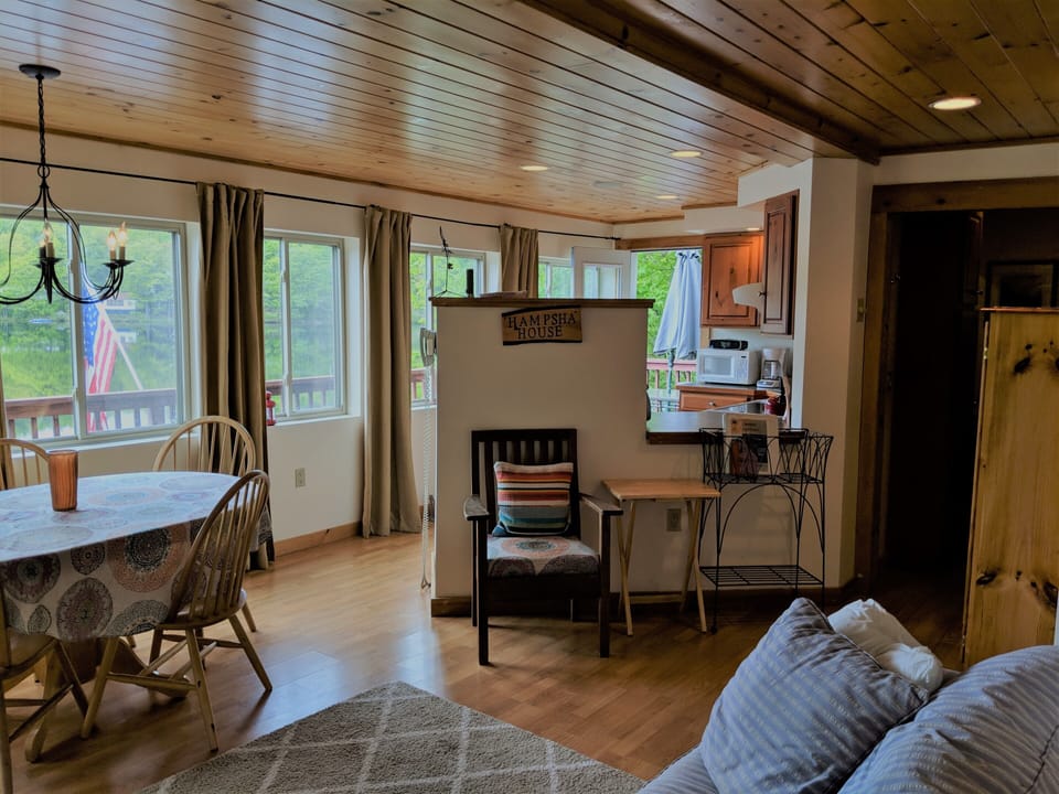The lake view is gorgeous thanks to the open floor plan and wall of windows.