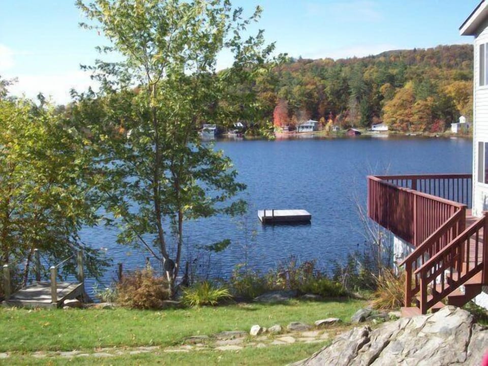 Split time between your own private swim raft and a wraparound deck this summer!