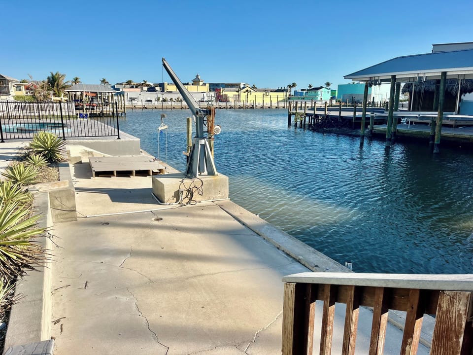 Dock on Canal.  Watch the Dolphins, Manatees and Boats go by. Try Fishing 