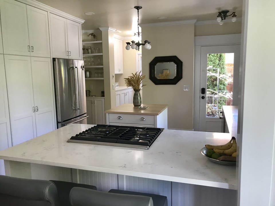 Kitchen - laundry area and half back in the distance.