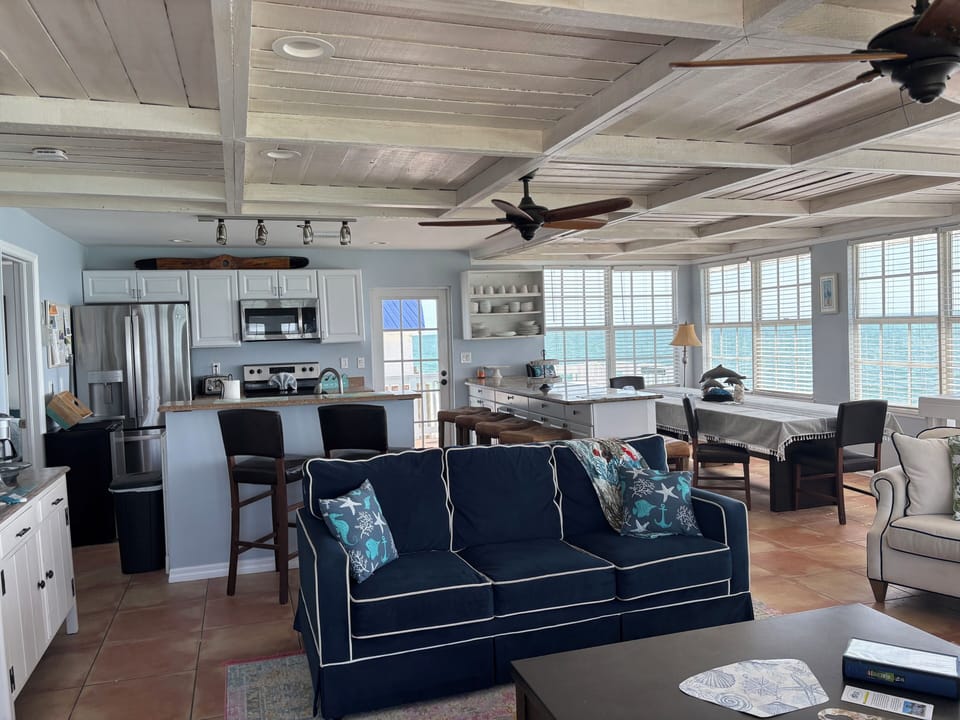 Large open concept upper level has panoramic ocean views