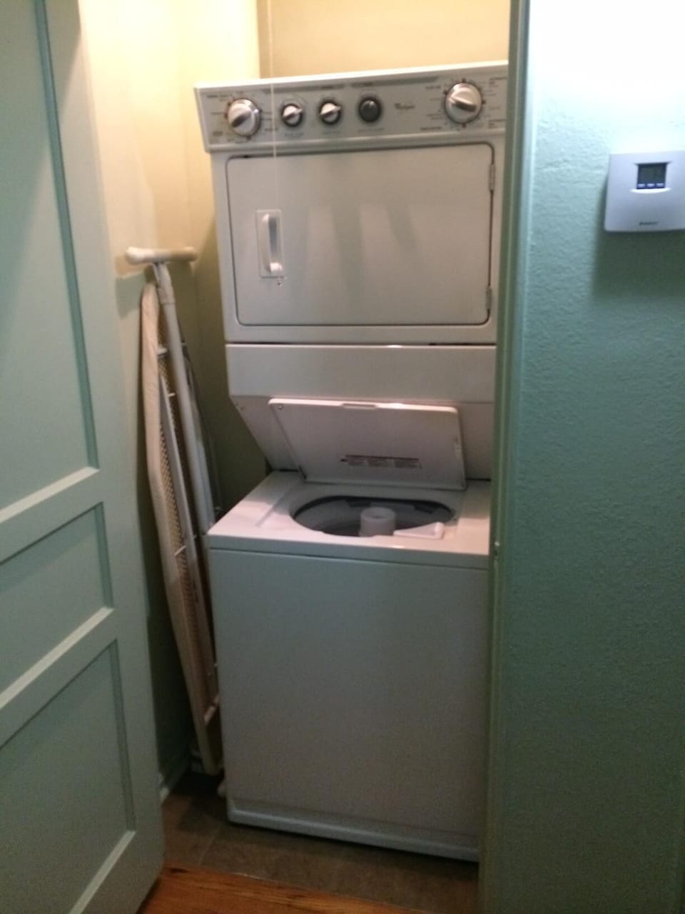Convenient washer and dryer tucked neatly in the hall closet.