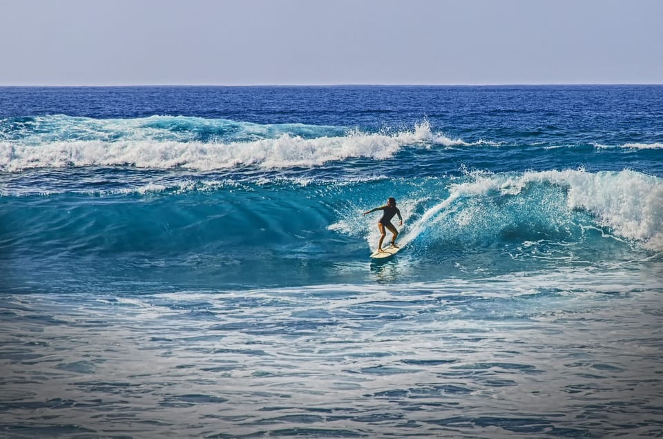 Surfing in front of house