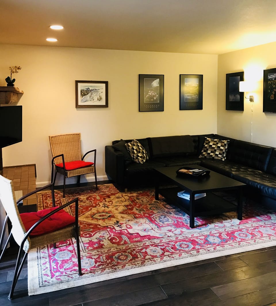 Large upstairs living room, with fireplace.