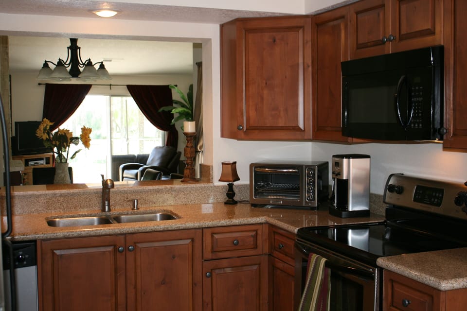 Kitchen with pass-through to dining and living rooms