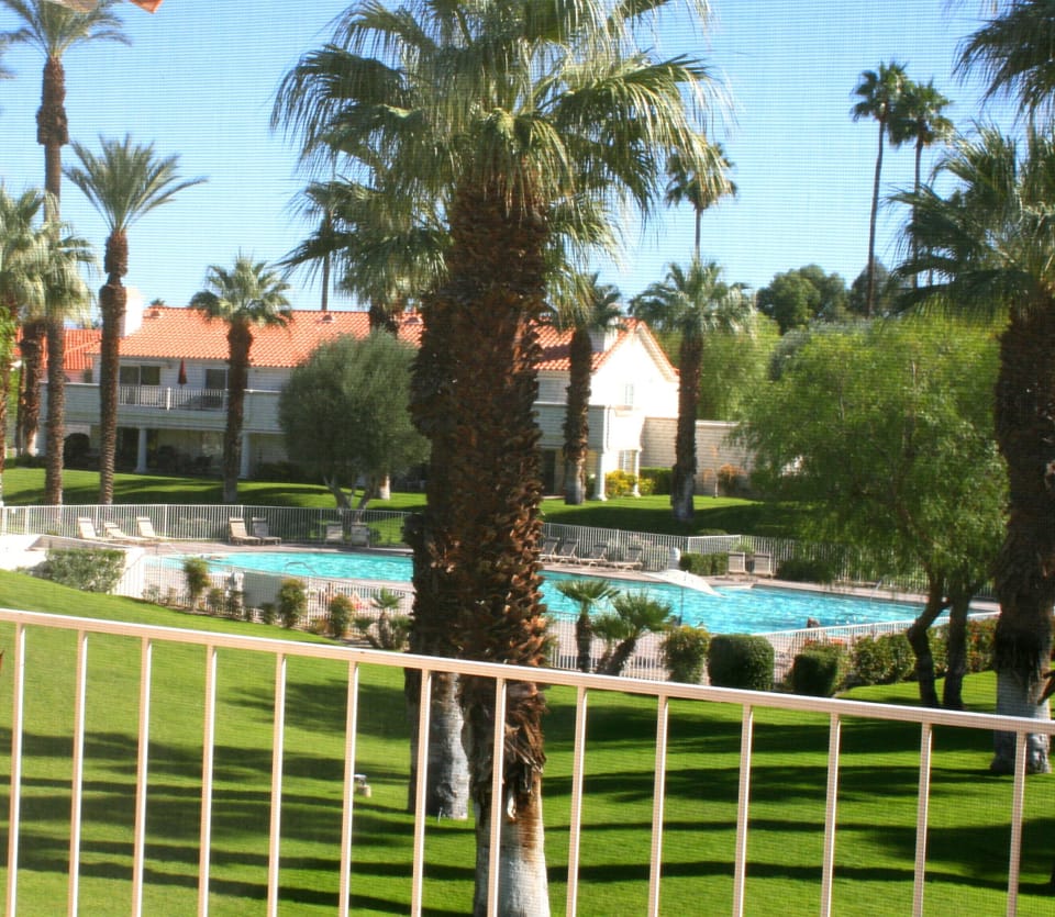 View of pool and grounds from deck