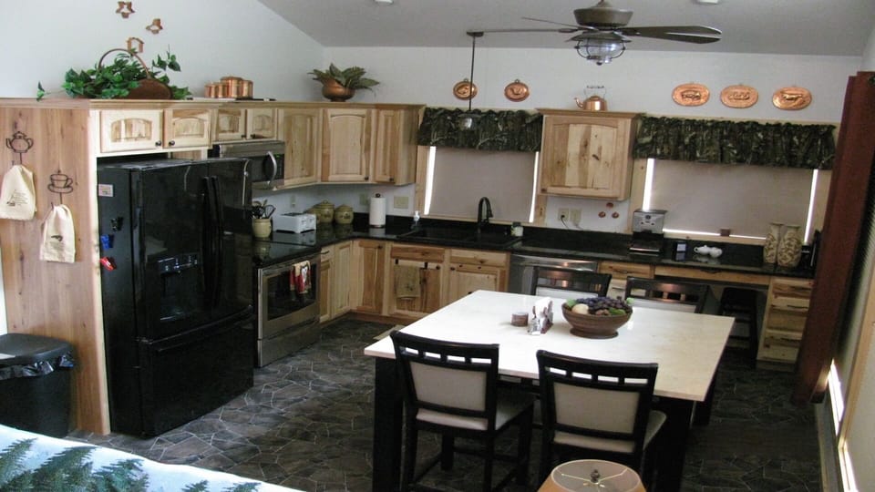 Kitchen furnished with modern appliances